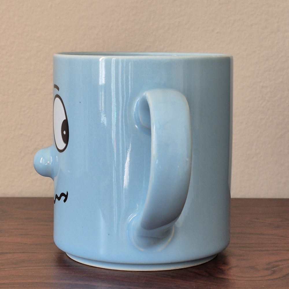 🪻3/$25 Vintage Light Blue Cartoon Face Mug 3D nose funny dizzy humor - Picture 3 of 5